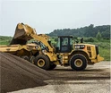 How does the CAT 980 Wheel Loader compare to its competitors?